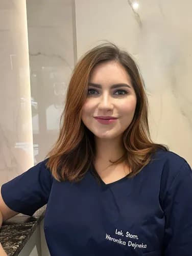 Przebarwione zęby estetyczna stomatologia piękny uśmiech Warszawa